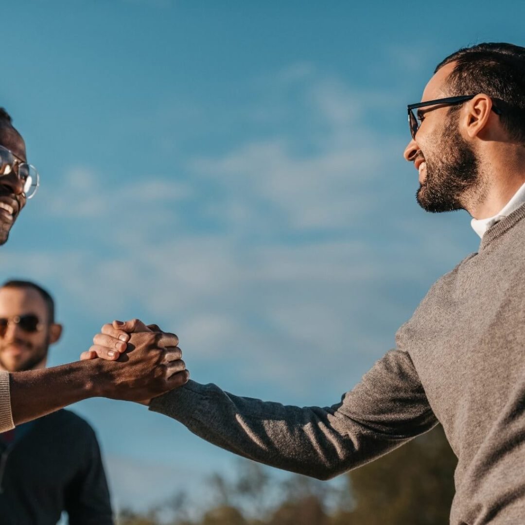 Picture of golf players greeting each other